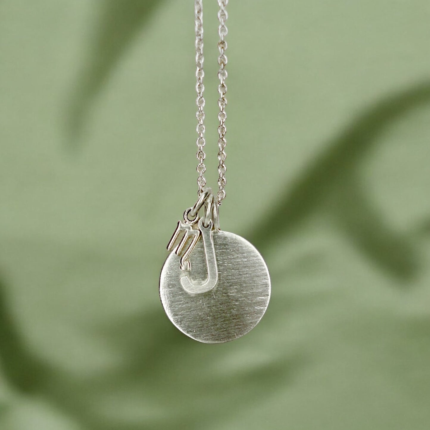 Custom engraved disc pendant necklace in sterling silver