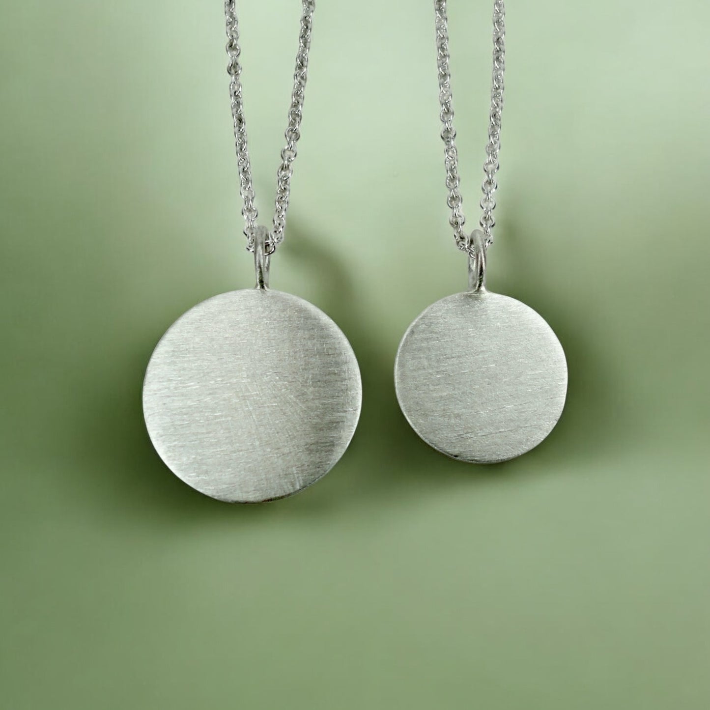 Custom engraved disc pendant necklace in sterling silver